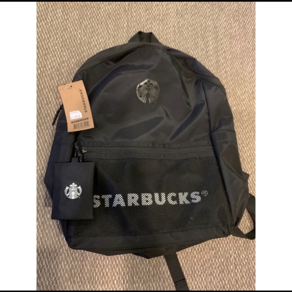 Brand new Starbucks limited edition black backpack with laptop holder inside.